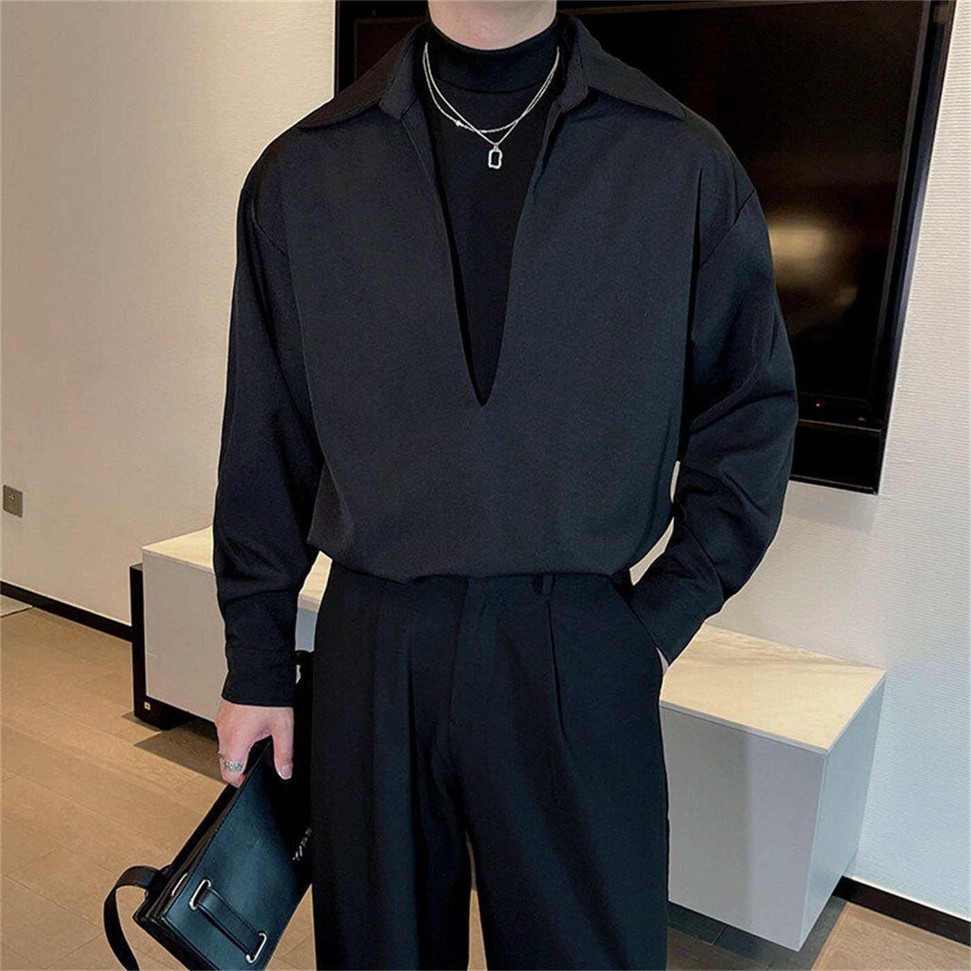 Handsome Man With Deep V-neck And Long Sleeve Shirt